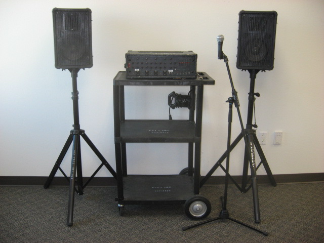<b>Basic PA system</b><br><br>Includes one microphone, one mixer/amplifier with four mic inputs, two speakers, 1/8" mini audio cable<br><br>$21/day